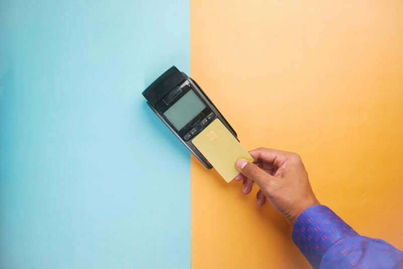 How can restaurants lower credit card processing costs with POS systems?